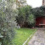 Appartamento Piano Terra Con Giardino Condiviso